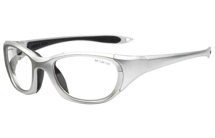A pair of silver RecSpecs Maxx 30 prescription glasses with rectangular lenses and thick, curved frames. The arms of the glasses are also silver and taper towards the ends. Inside the temple, text indicating size and specifications is visible.