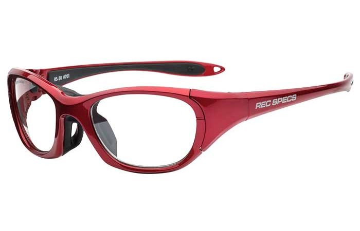 A pair of red RecSpecs RS-50 sports glasses with thick, durable frames and clear lenses. The temples have black accents, and the inside of the arms is labeled RS-30 8/001.