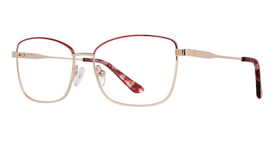 A pair of Vivid Expressions 1134 eyeglasses with red rims.