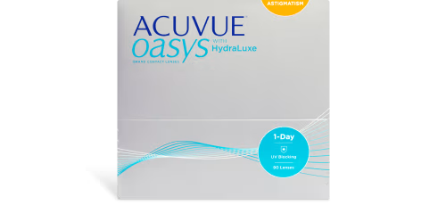 The image shows a box of ACUVUE® OASYS® 1-Day for ASTIGMATISM contact lenses from Johnson & Johnson, designed with HydraLuxe. The silver box features blue and white text, along with a circular label indicating 1-day lenses, UV protection, and 90 lenses per box.