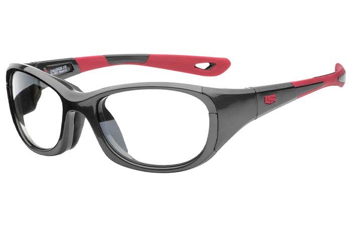 Image of a pair of RecSpecs - Challenger XL stylish safety glasses with a black frame and red accents. The temples are designed with red rubber inserts for comfort and grip. Featuring clear lenses, these RecSpecs protective eyewear offer exceptional vision protection and are suitable for industrial or laboratory environments.