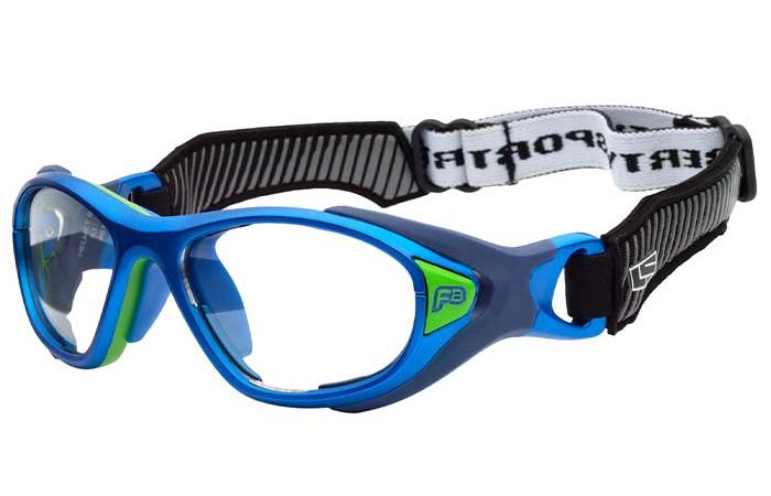 A pair of blue RecSpecs Helmet Spex sports goggles with a black and white adjustable strap. The goggles have clear lenses, green and blue accents, and a cushioned nose bridge for comfort. The detachable strap features a striped pattern and RecSpecs branding, meeting impact resistance standards for helmet sports activities.