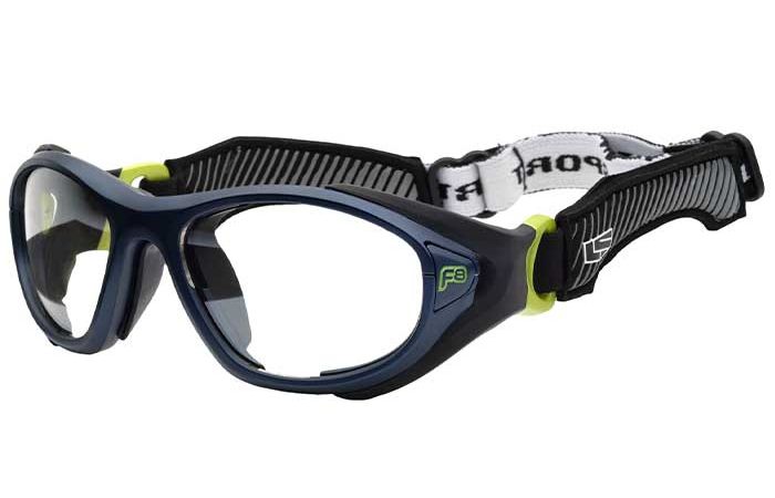 These RecSpecs Helmet Spex blue sports goggles come with a black and white adjustable strap. Featuring clear lenses and a rubberized frame adorned with a small green logo on the side, they meet impact resistance standards. The black strap also boasts a textured design with yellow accents near the frame attachment points.