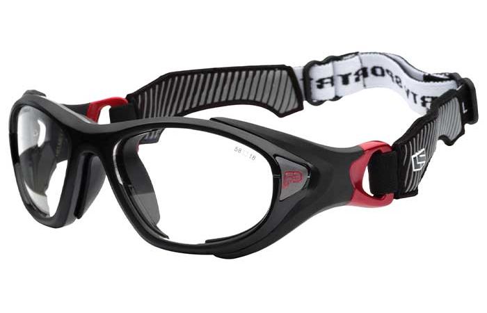 A pair of RecSpecs Helmet Spex XL by RecSpecs with clear lenses, meeting impact resistance standards, featuring an adjustable and elastic strap. The strap has a black and white design with the word "SPORT" visible. Red accents are present near the lenses' frame connection points.
