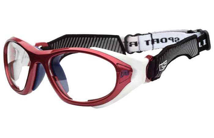 Red and white sports goggles with clear lenses and a black adjustable strap featuring white text. The robust frame meets impact resistance standards, making these RecSpecs Helmet Spex XL ideal for helmet sports and designed for protective purposes during activities.