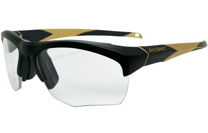 A pair of black RecSpecs Impact sports glasses with clear lenses and gold accents on the temples. The frame features a partial rim design, and the brand name "RecSpecs" is visible on the side.