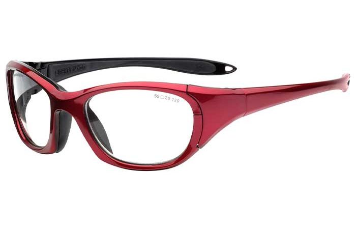 RecSpecs Maxx 30 by RecSpecs: Red and black sports safety glasses with clear lenses, featuring thick frames and side arms designed for protection. The glasses have a sleek, wraparound style ensuring a secure fit.