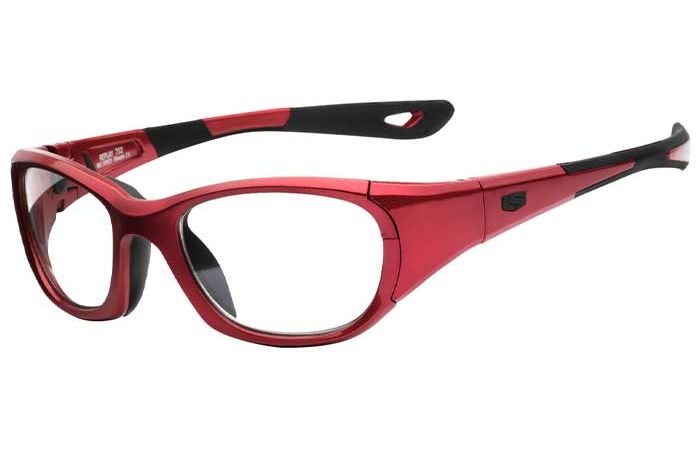 A pair of RecSpecs Replay XL red sports safety glasses with black accents, featuring wraparound frames and clear lenses. The arms of the RecSpecs Replay XL glasses have ergonomic, sleek design elements and there are ventilation holes on the ends.