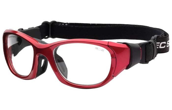 A pair of red RecSpecs RS-51 sports goggles with clear lenses and a black adjustable strap. The RecSpecs goggles have a sturdy design with padding on the inside for comfort and protection, suitable for high-impact activities. The strap has a buckle for secure fastening.