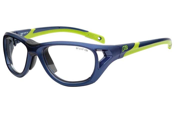 A pair of sporty, two-toned RecSpecs Sport Shift XL glasses with navy blue frames and lime green accents. The design includes side guards, flexible ear pieces, and a rugged look ideal for physical activities. The inside of the frame features a printed size specification.