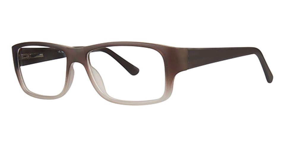 A pair of Metro 27 rectangular eyeglasses by Vivid with a gradient color design, transitioning from dark brown at the top to a lighter shade at the bottom. The frame, crafted from durable plastic, exudes contemporary elegance with its sleek and solid, straight temples.