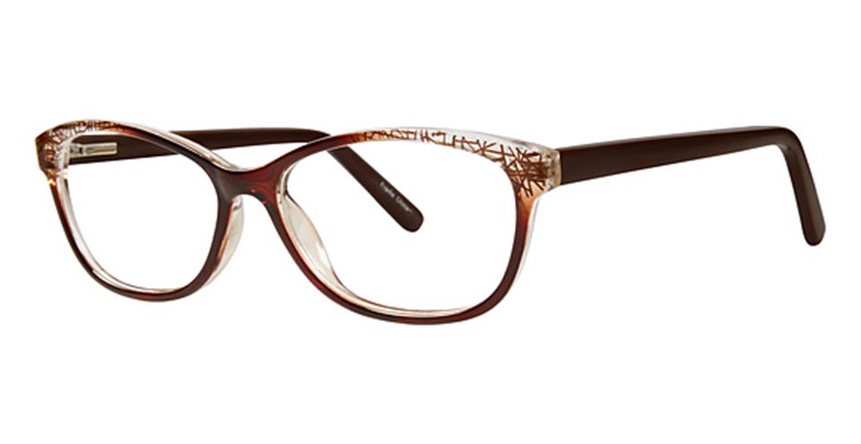 Rectangular eyeglasses with black temples and clear brown gradient frames. The upper section of the durable plastic frames features a delicate, abstract pattern design. Featuring a spring hinge design, the lenses are transparent, and the overall look is both stylish and modern. Introducing *Metro 28* by *Vivid*.