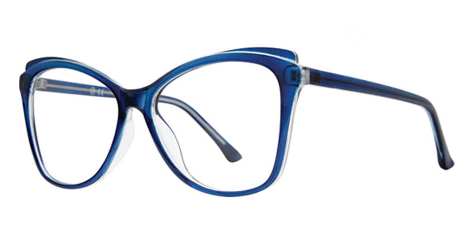 A pair of stylish Vivid Soho 1075 eyeglasses with blue, slightly cat-eye-shaped frames and clear lenses. The frame's arms are also blue, tapering slightly towards the ends. These durable, lightweight frames exude a chic, contemporary style.